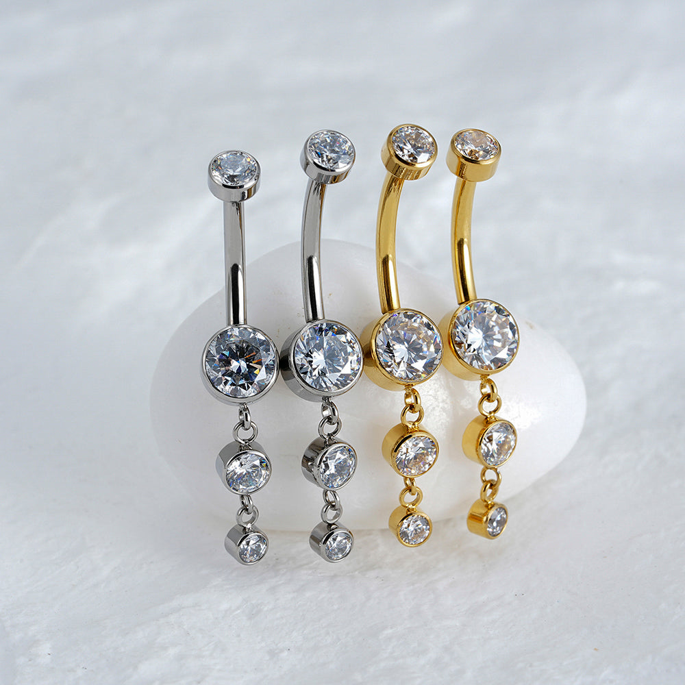 Manek° Piercing para ombligo  ASTM F136 de titanio con colgante de circonita en bisel cúbica 14G.