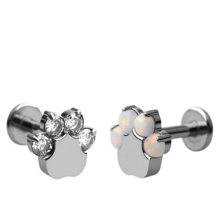 Manek° Piercing labret helix ASTM F136 de titanio con rosca interna, engaste de garra, ópalo y circonita con forma de huella de pata 16G.