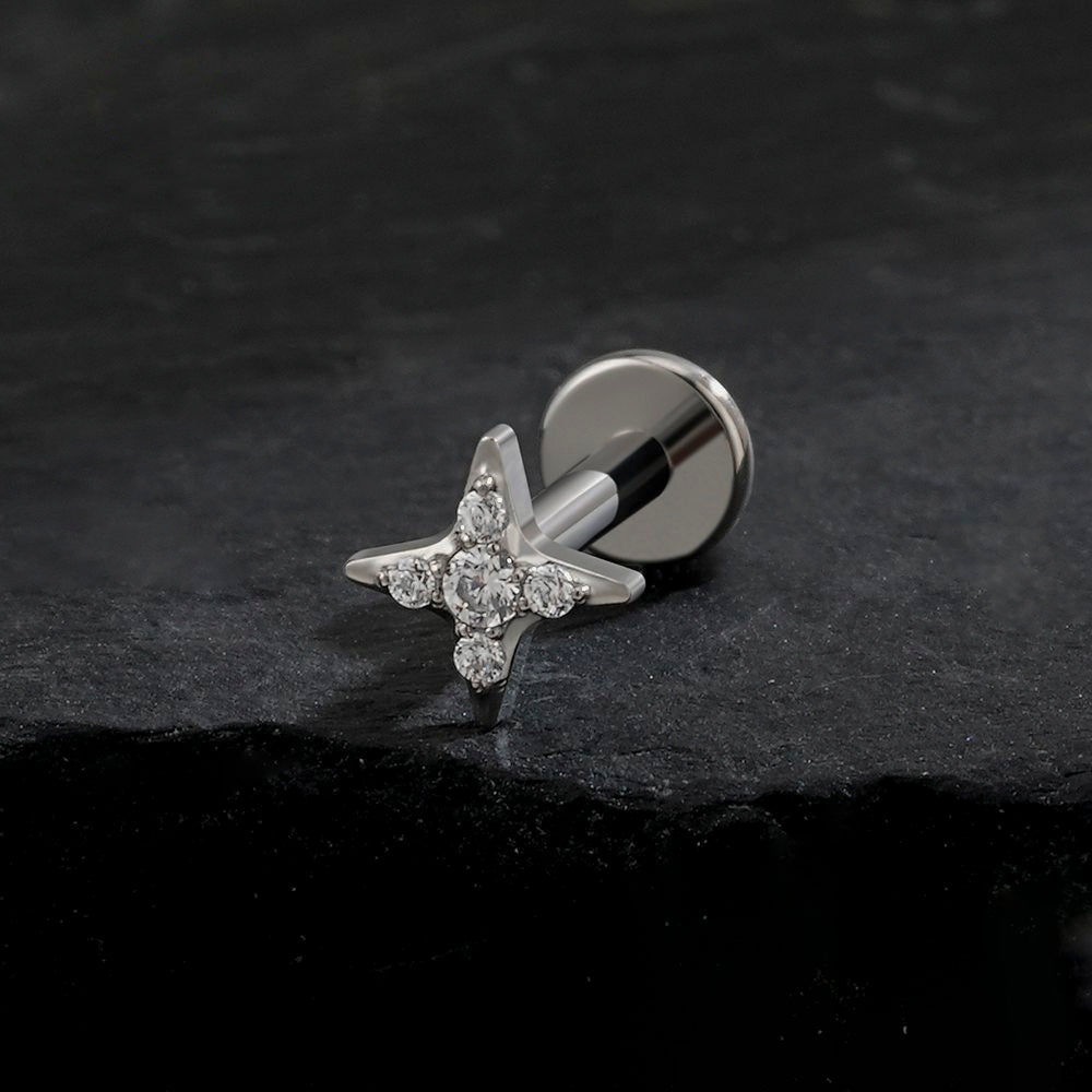 Manek° Pendiente de titanio ASTM F136 con rosca interna y circonita cúbica en forma de estrella,  para piercings en hélix, tragus, cartílago, labret y Monroe 16G.