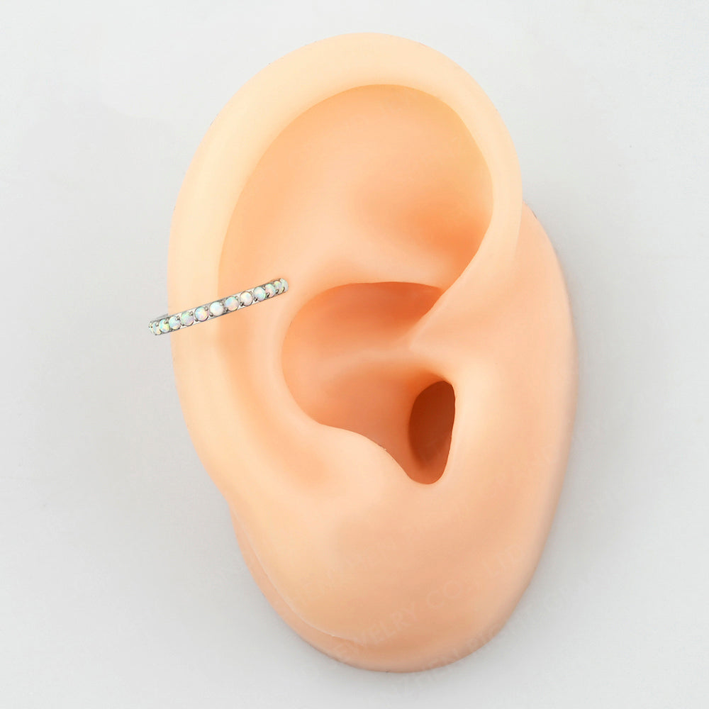 Manek° Piercings Argolla ASTM F136 de titanio de grado implante con garras y piedra de Opalo 16G.
